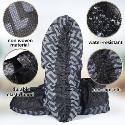 Tessuto nero non tessuto Respirante PE Tessuto resistente allo slittamento Scarpe usa e getta Copertura